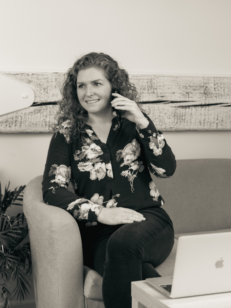 Family solicitor Tammy Parnell sitting at laptop in office at Wroxham, Norfolk